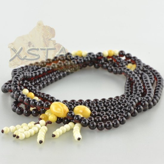 Tibetan Buddhist prayer butter and cherry amber rosary